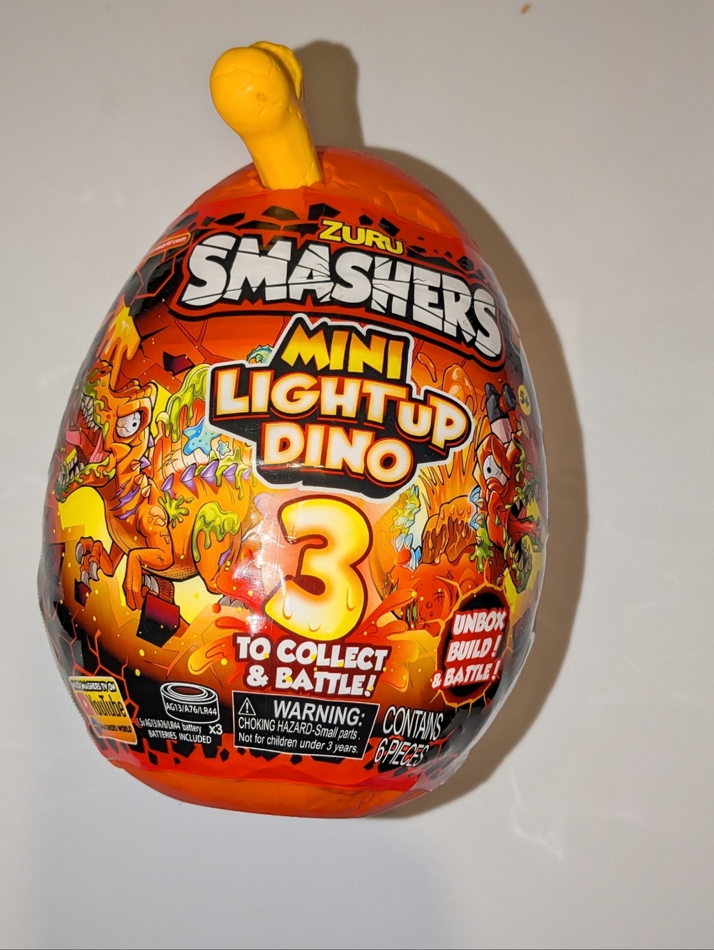 Smashers Mini Light Up Dino Surprise Egg